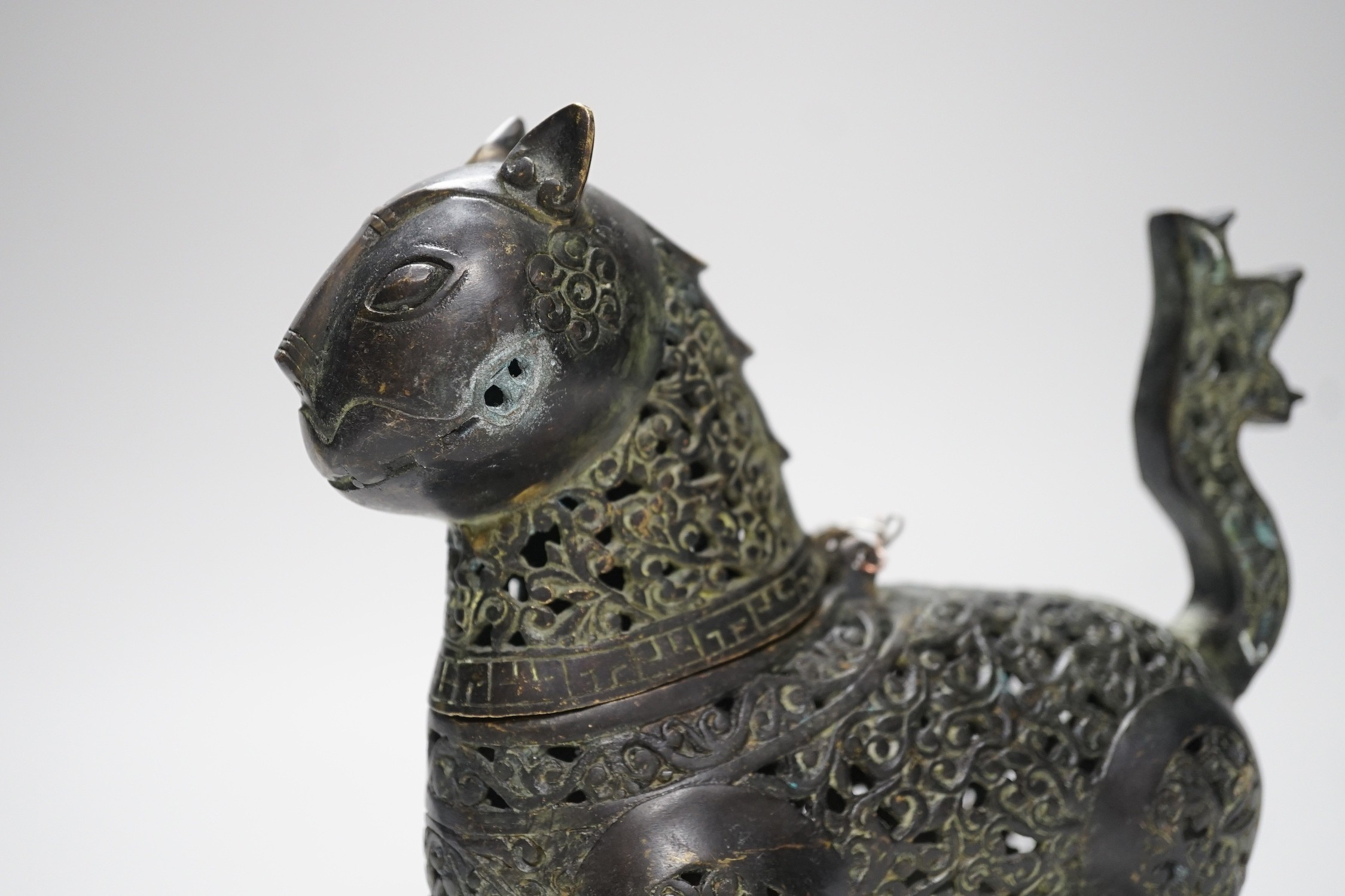 An early 20th century cast bronze Indonesian ‘lion dog’ incense burner. 18cm high